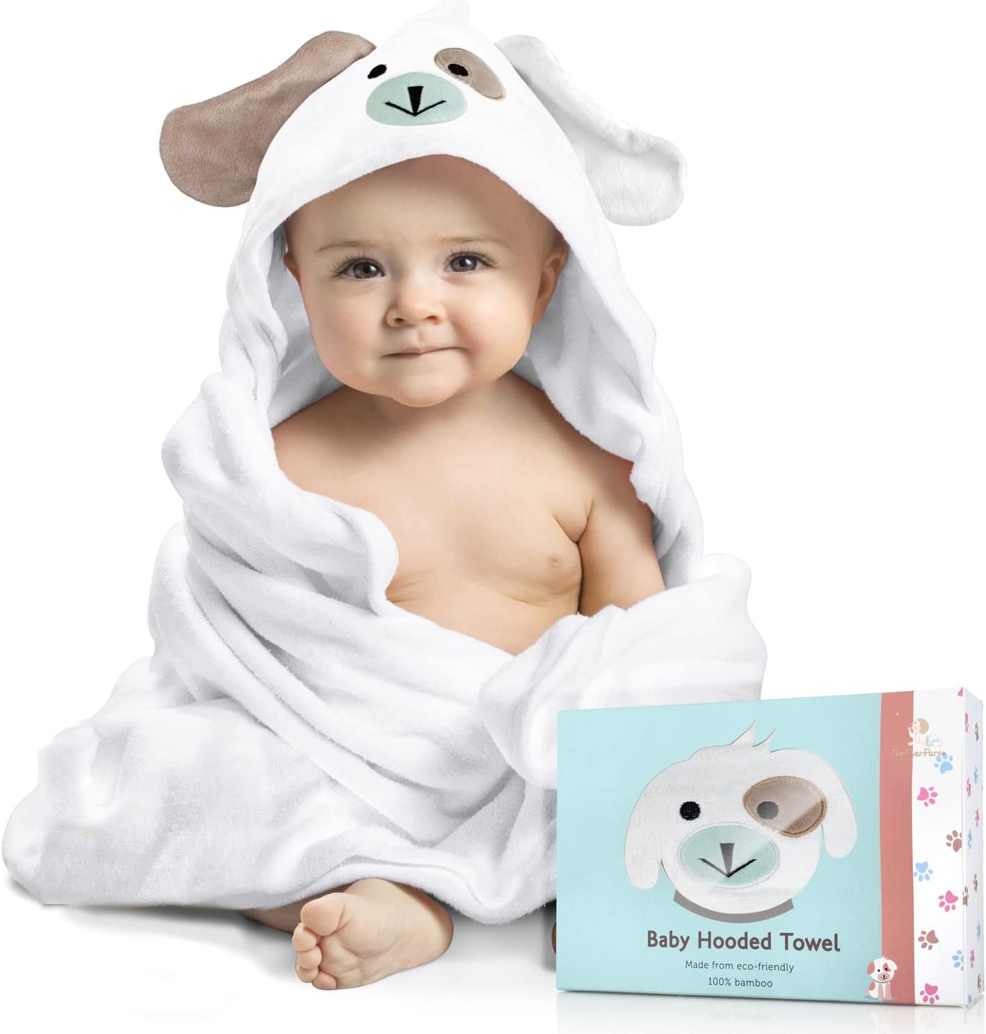 Young baby boy wearing a hooded towel with a dog's face imprinted on the hood, and ears sticking out of the top